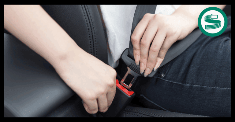 Diagram showing a seat belt extender being used in a UK car to provide extra belt length for a plus-size passenger